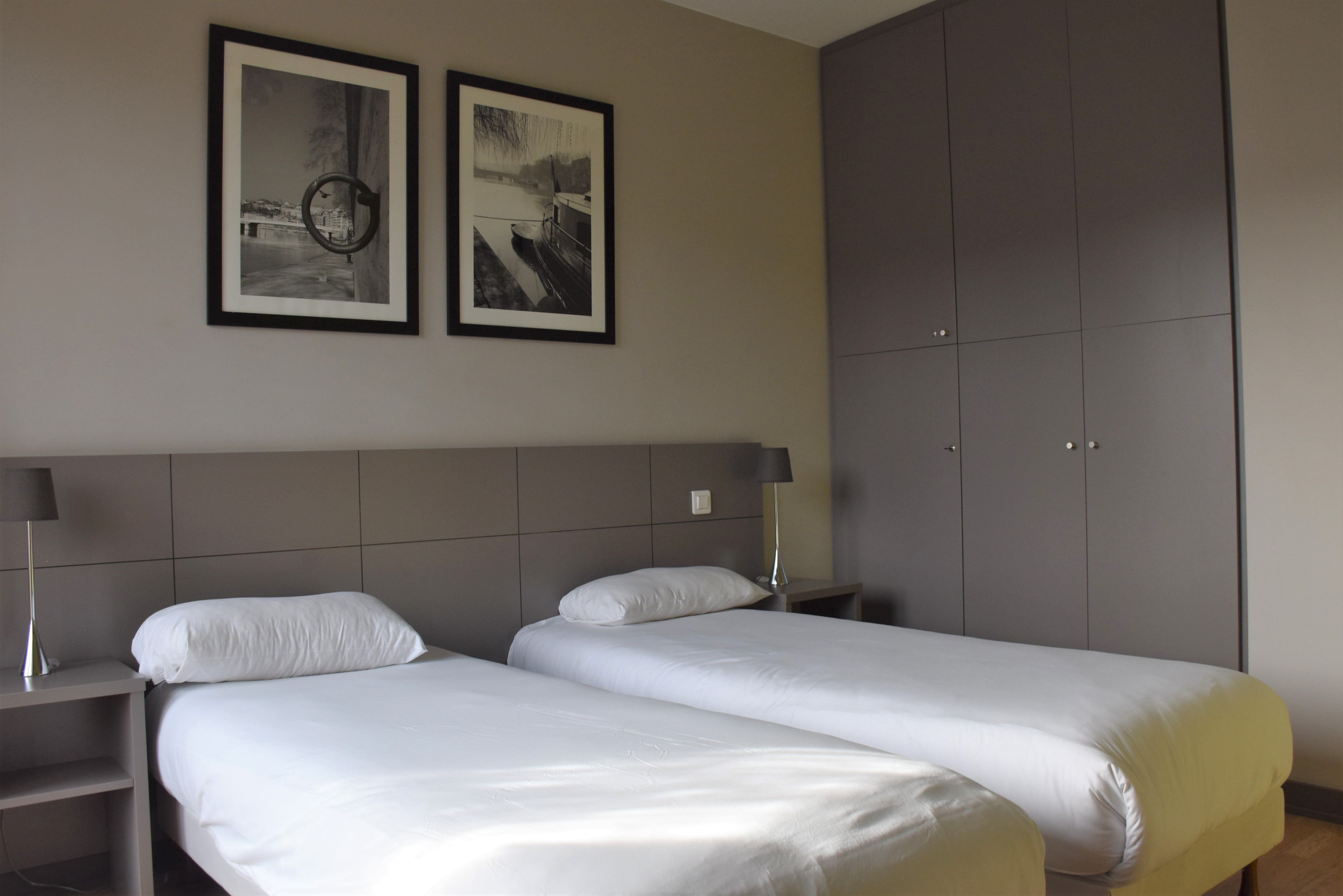 image Welcome to our modern 21m2 twin room in Lyon.