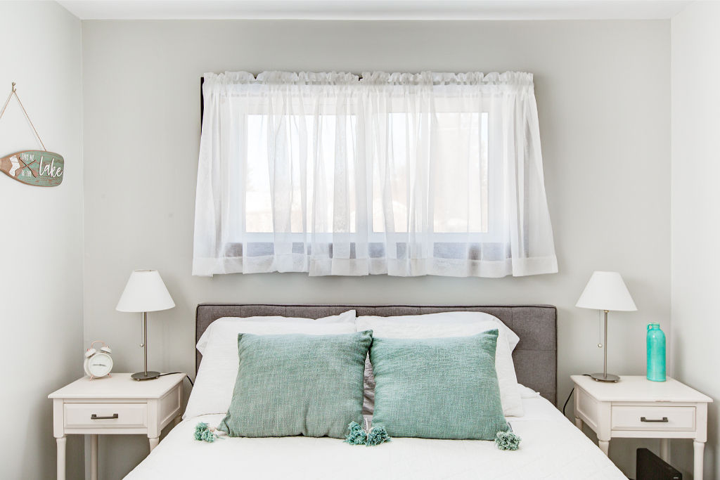 image A bedroom that's a breath of fresh air, with calming mint accents.