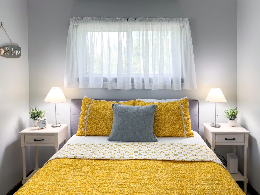 image A bedroom that's a breath of fresh air, with calming mint accents.