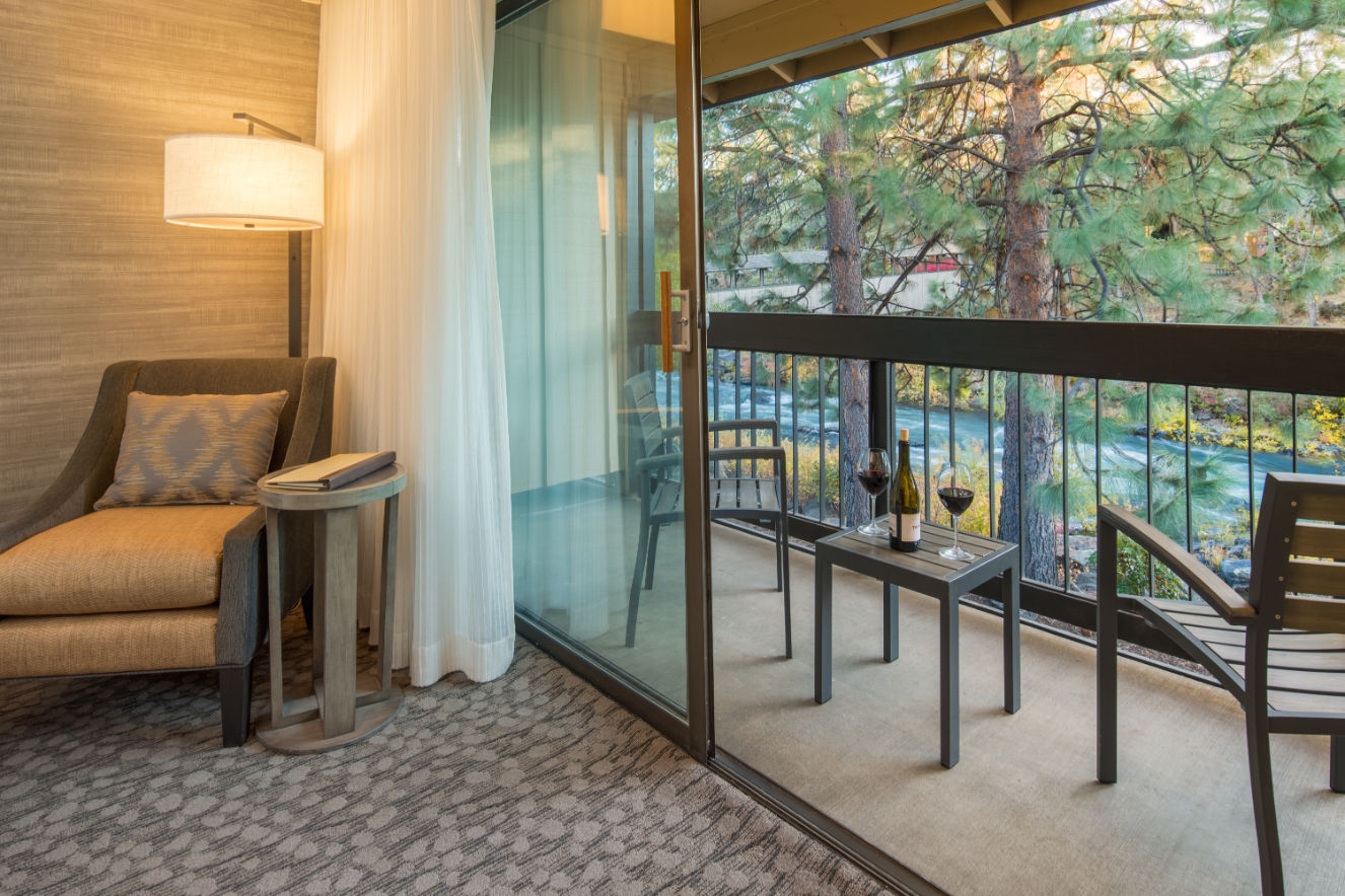 image River view with a balcony or patio.