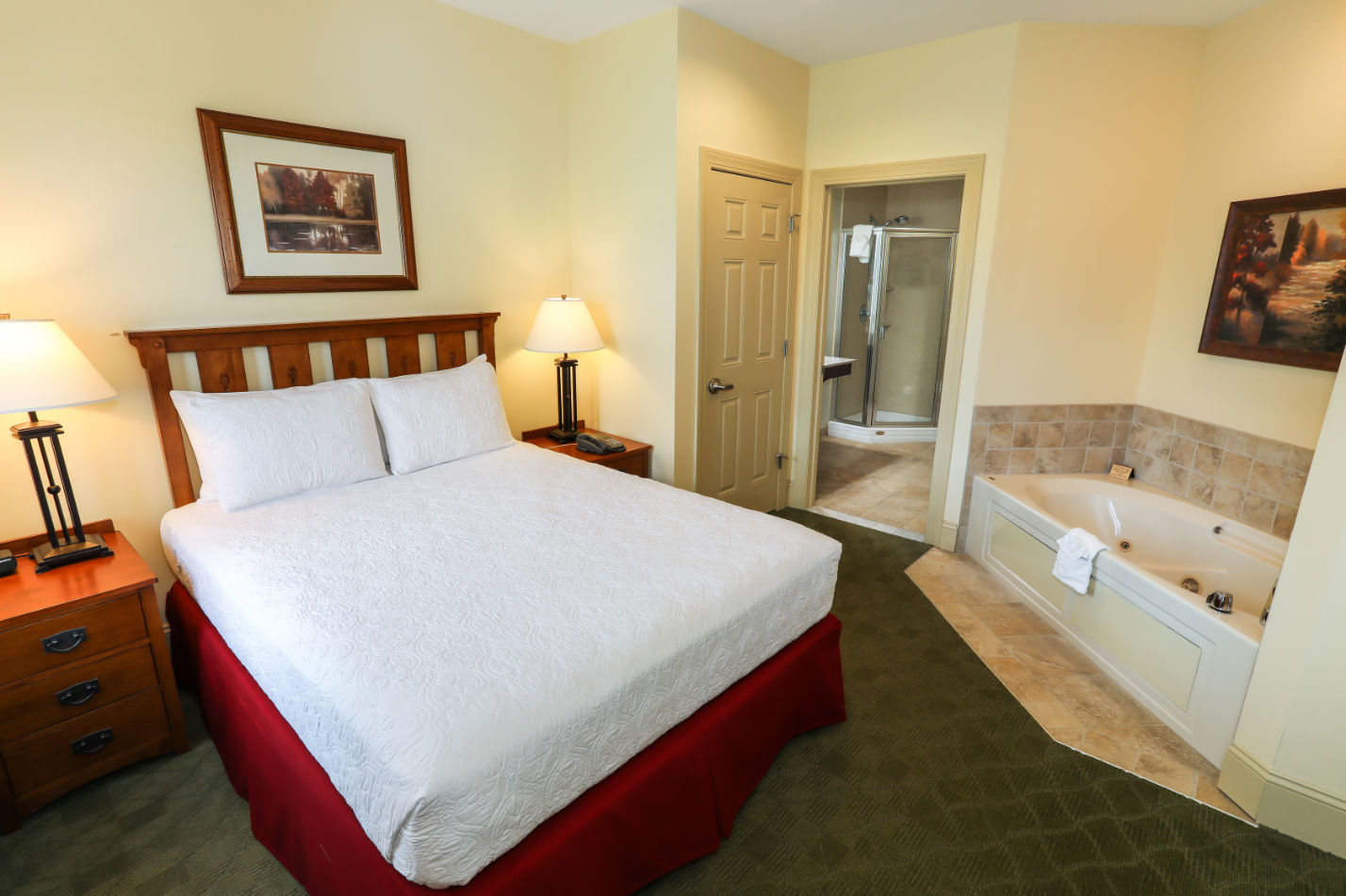 image Cozy bedroom retreat with an in-room Jacuzzi, creating the perfect space for relaxation and comfort.