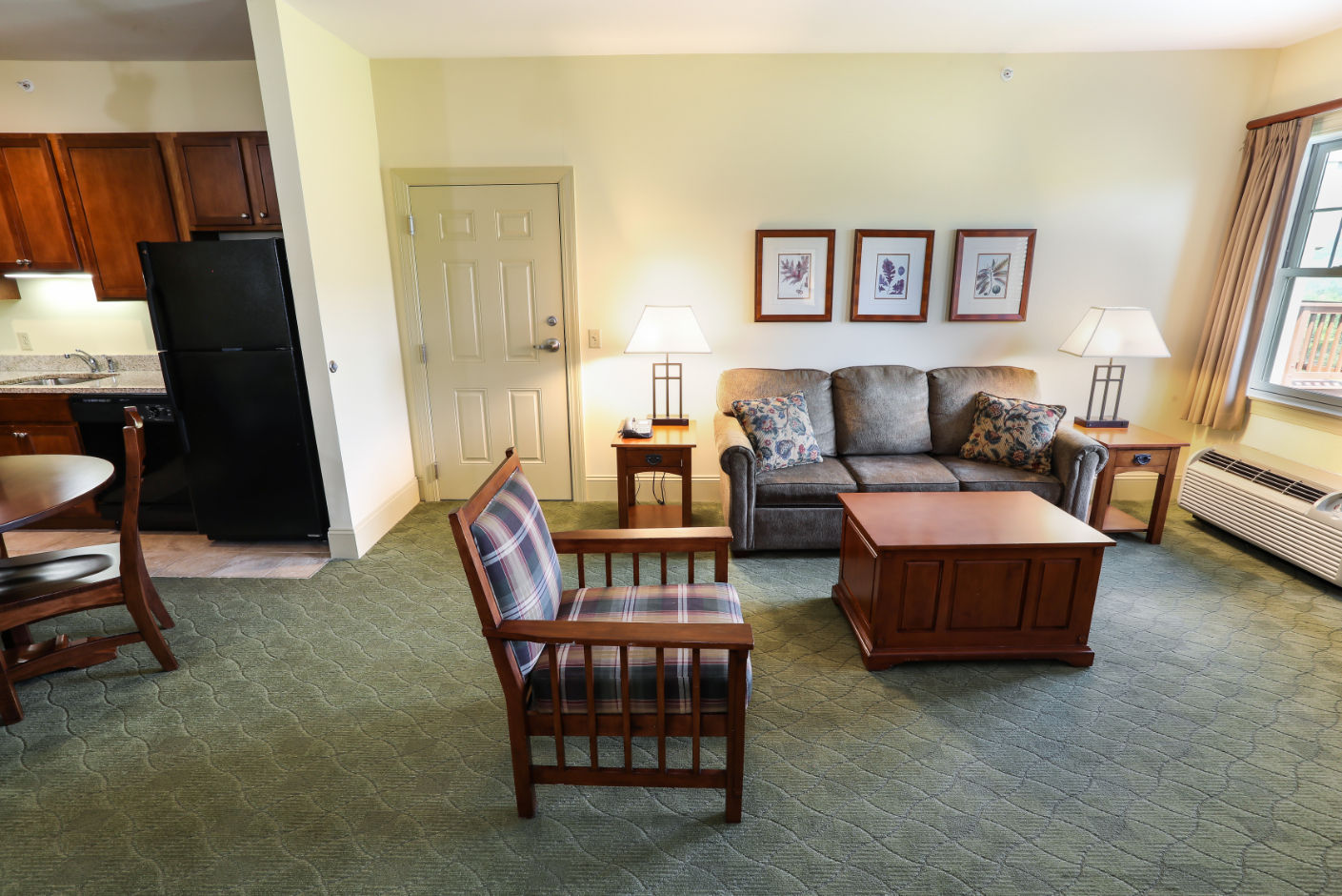 image Inviting living area with warm decor and natural light, ideal for unwinding after a long day.
