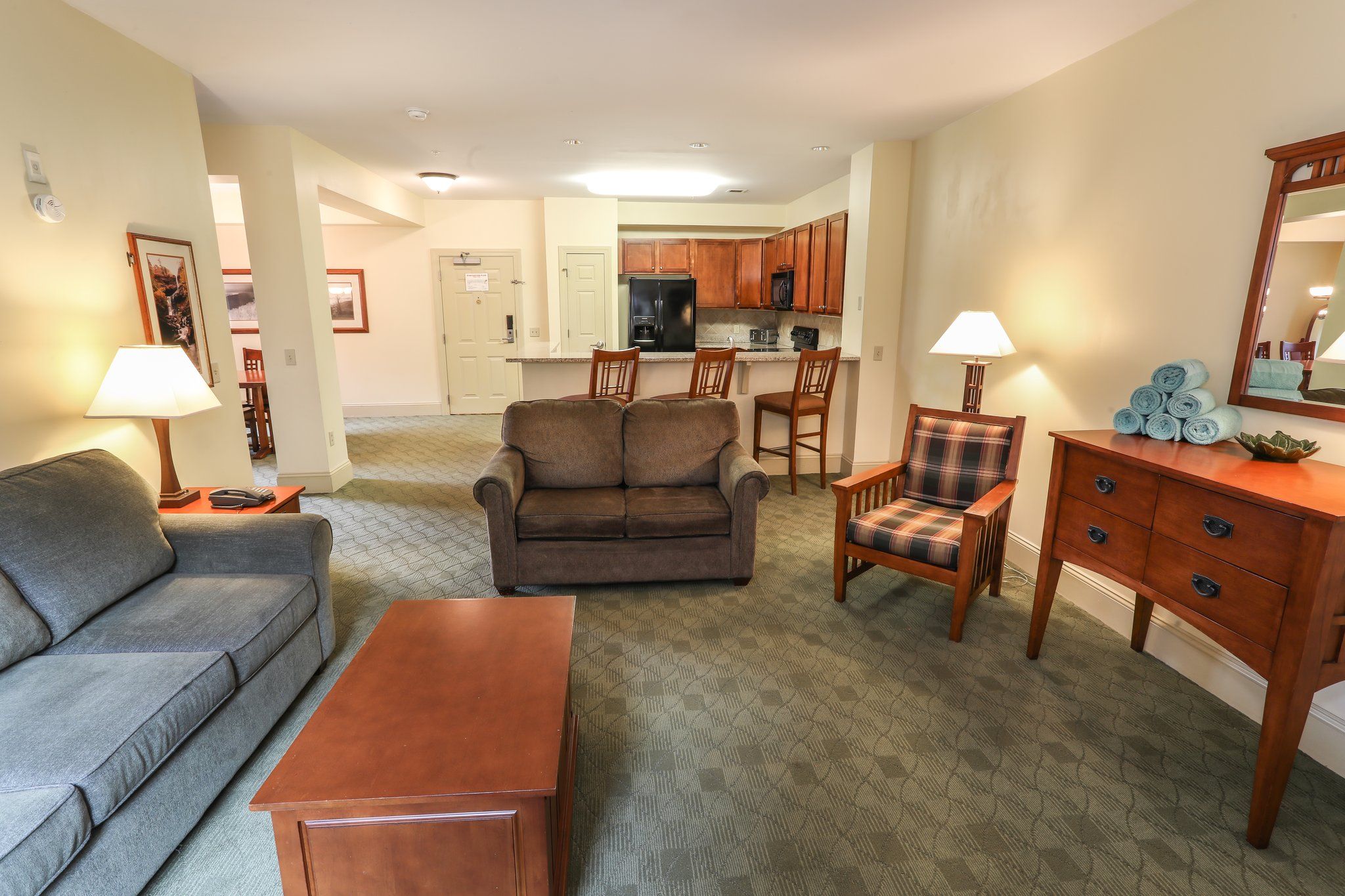 image Cozy living area with plush seating and a warm, inviting atmosphere for relaxing.