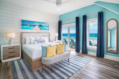 Wake to views of the gulf in the third-floor Primary Bedroom.