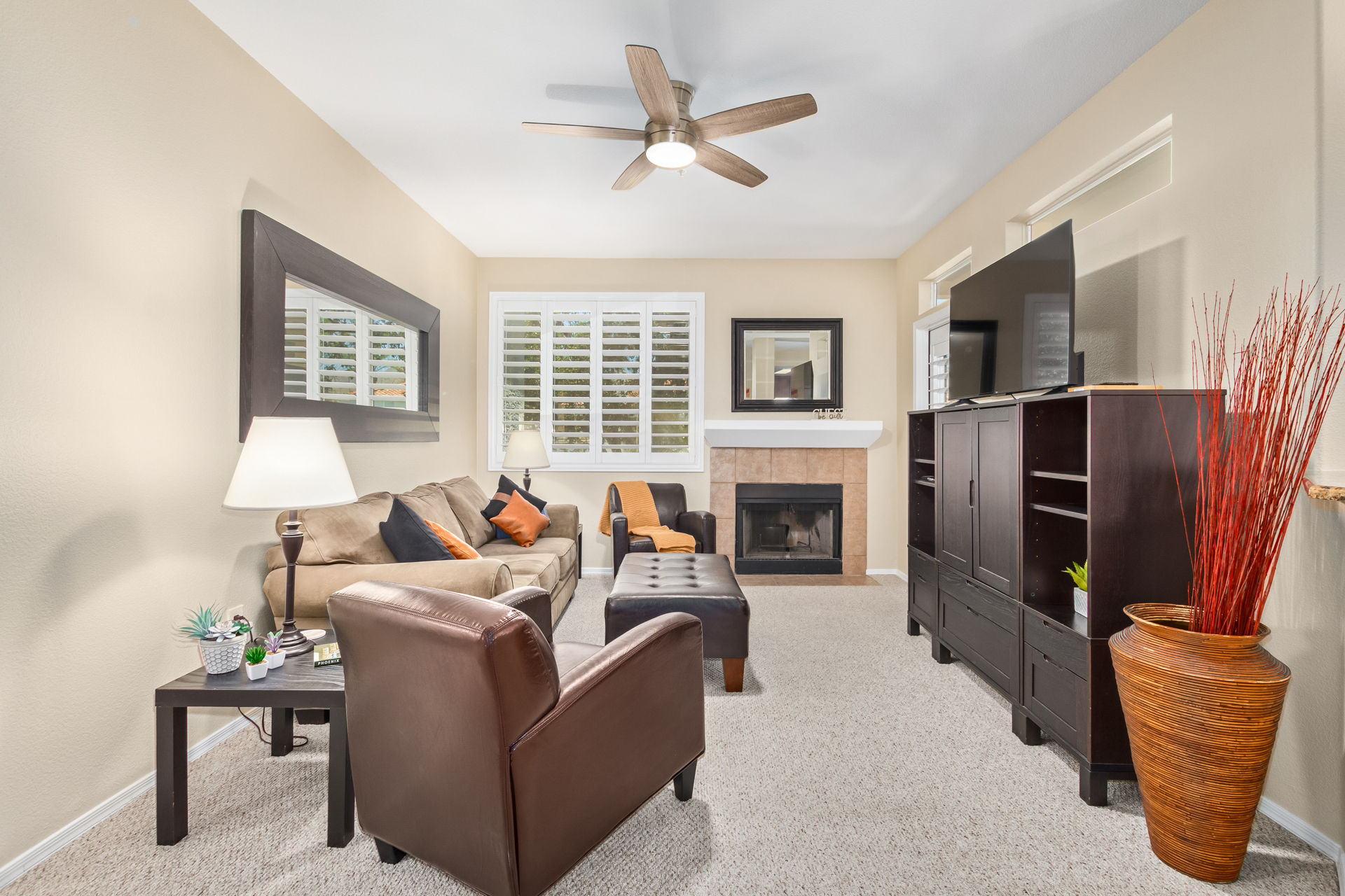 image Relax or entertain in our cozy living room, designed with comfort in mind.