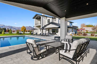 Dine alfresco on the private patio with an outdoor dining set.