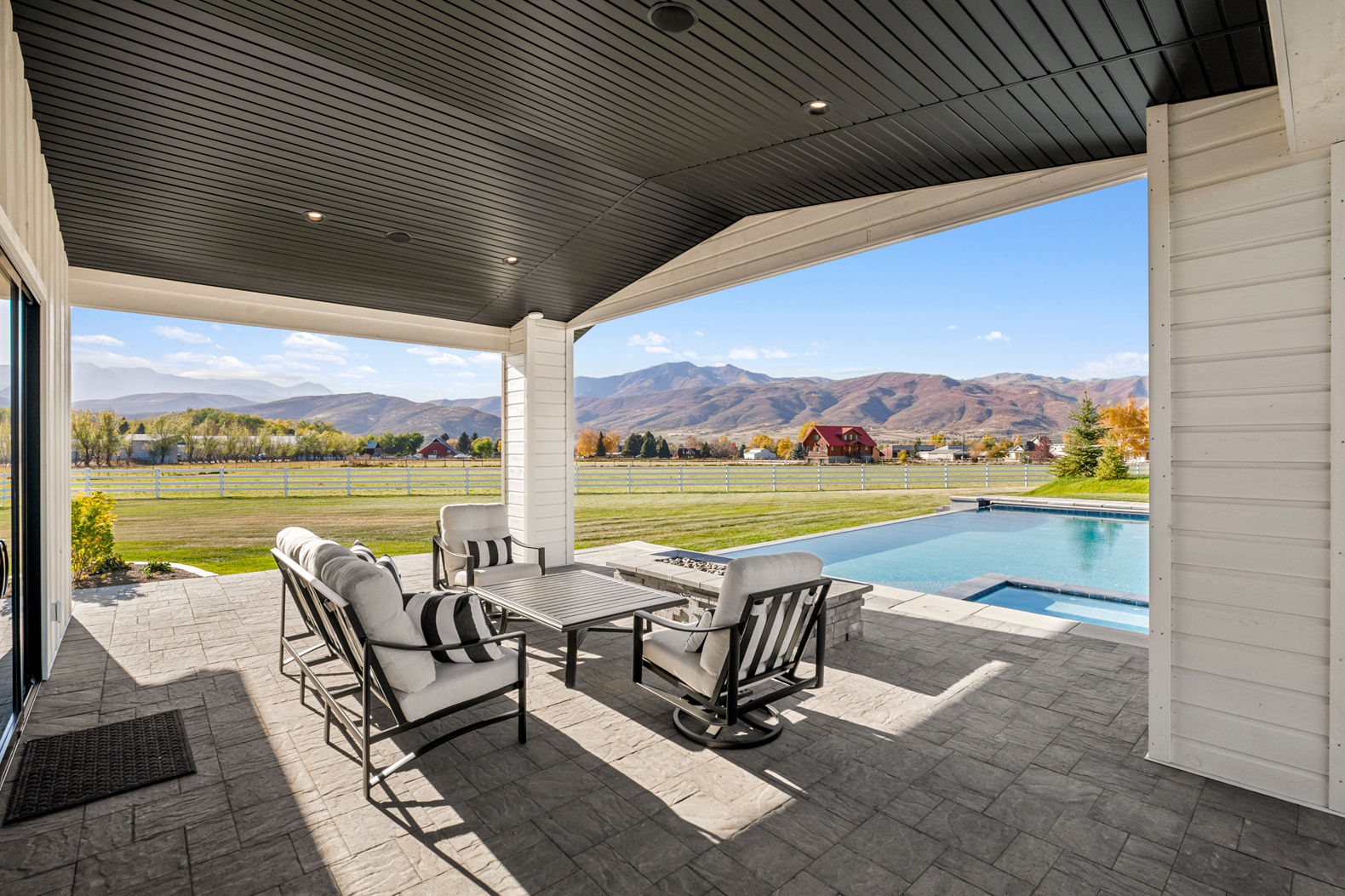 image Enjoy scenic vistas from the cozy and stylish patio.