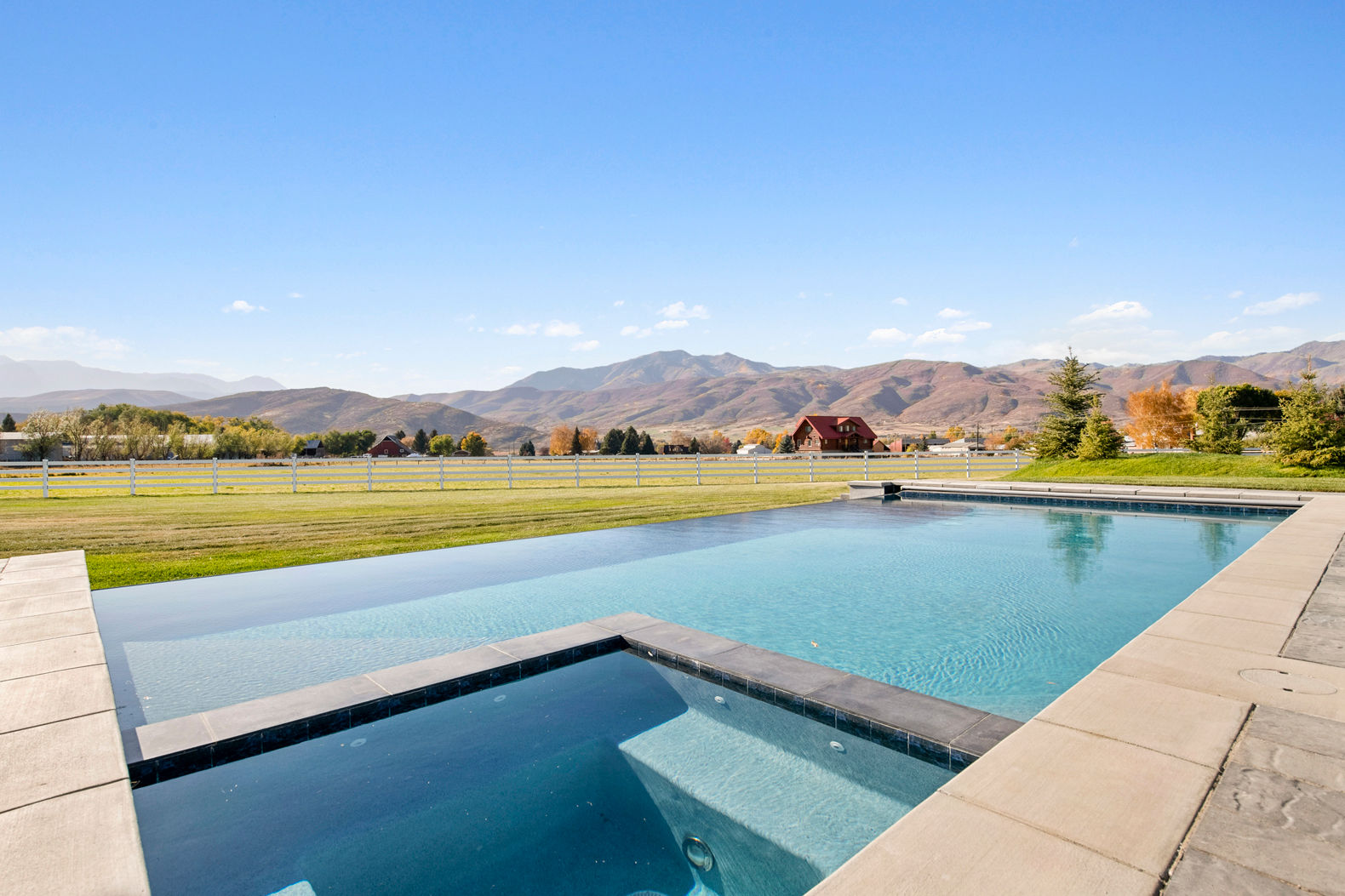 image Wake up to breathtaking mountain views in this chic studio pool house.