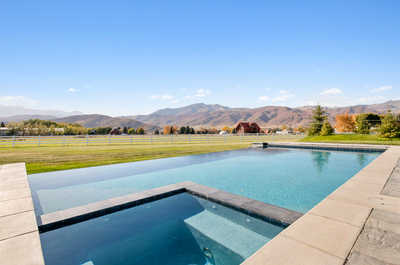 Wake up to breathtaking mountain views in this chic studio pool house.