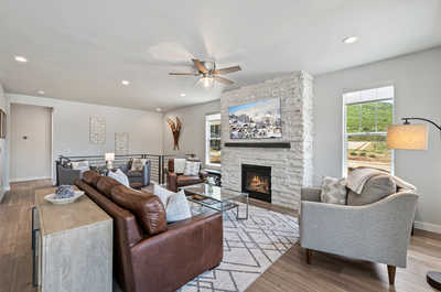 Wind down in our stylish living area with a warm wood-burning fireplace.