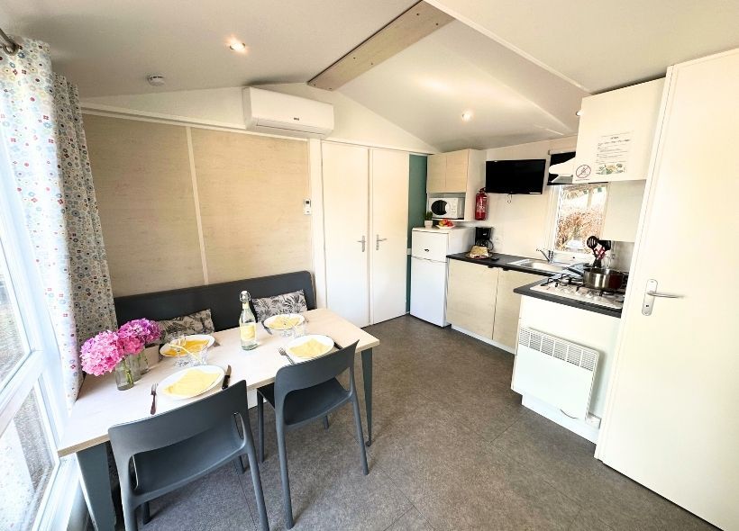 image Bright dining area with plenty of natural light, perfect for enjoying meals together.