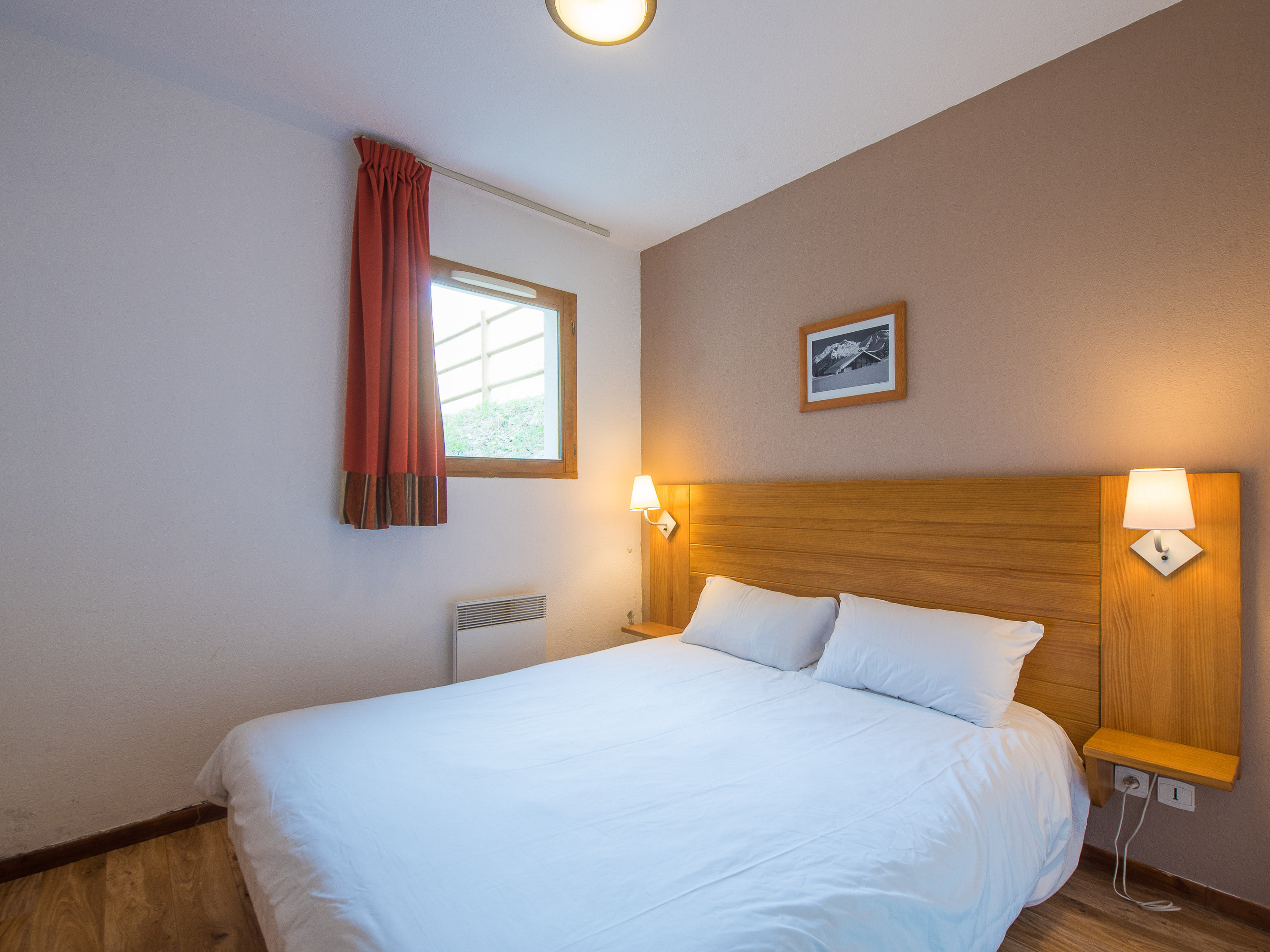 image  Experience a peaceful night's sleep in our tranquil and cosy bedroom.