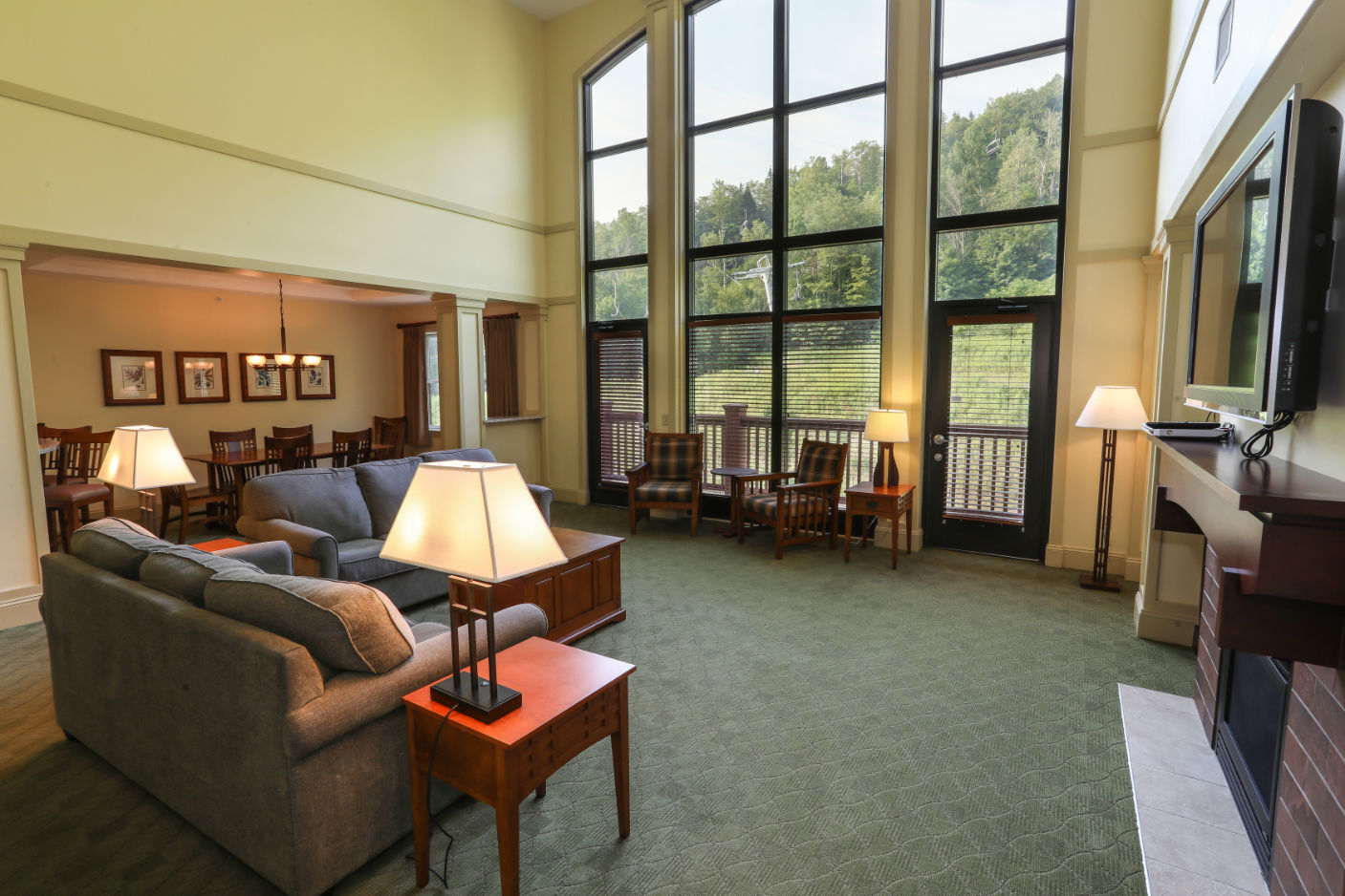 image Cozy and inviting lounge area, designed for comfort with plush seating and warm lighting.