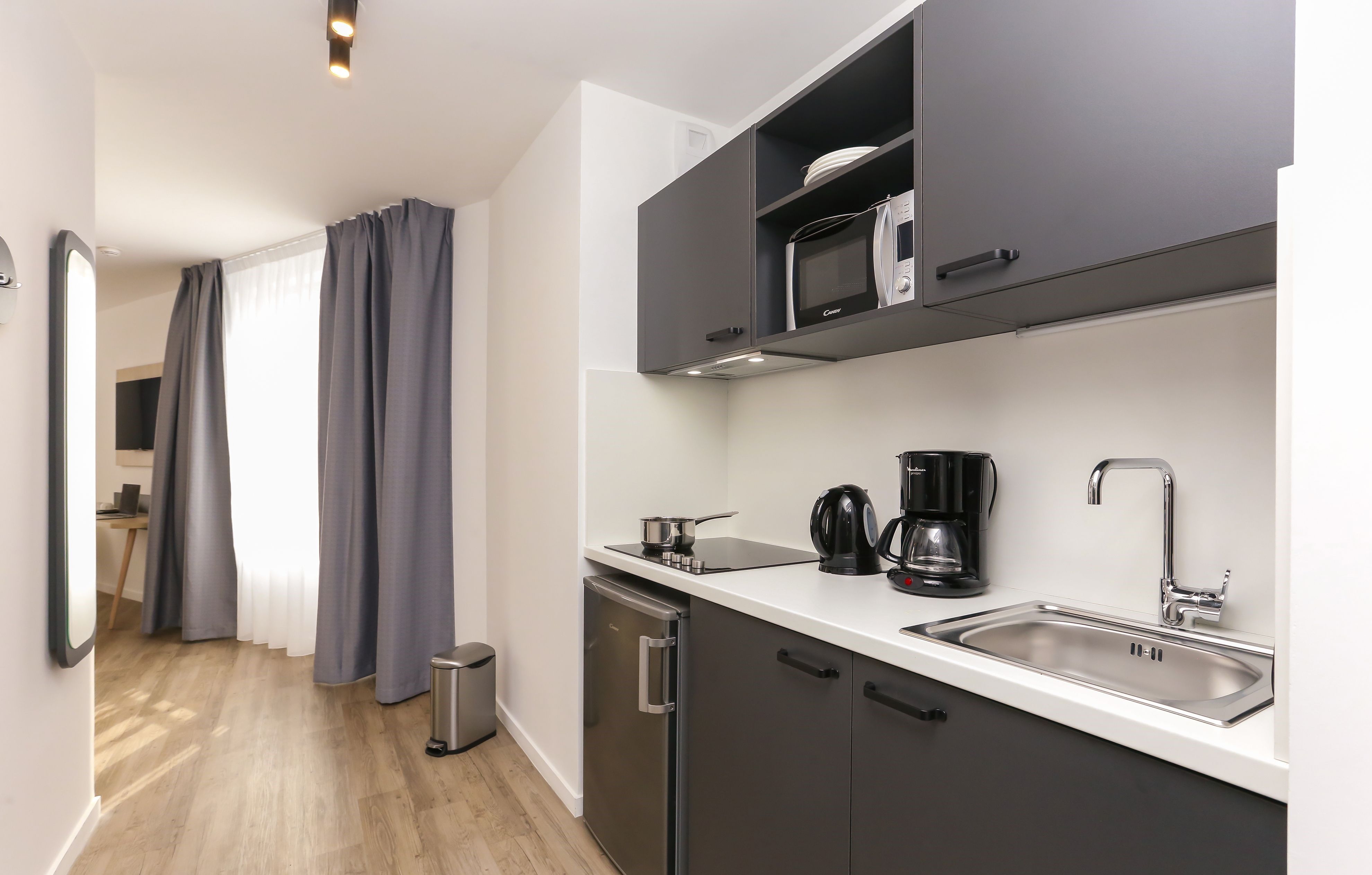 image The kitchenette is equipped with all the necessary appliances.