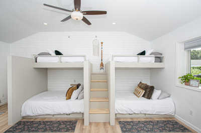 The bonus room offers bunk beds for added fun, and direct patio access ensures you're always connected to the outdoors.