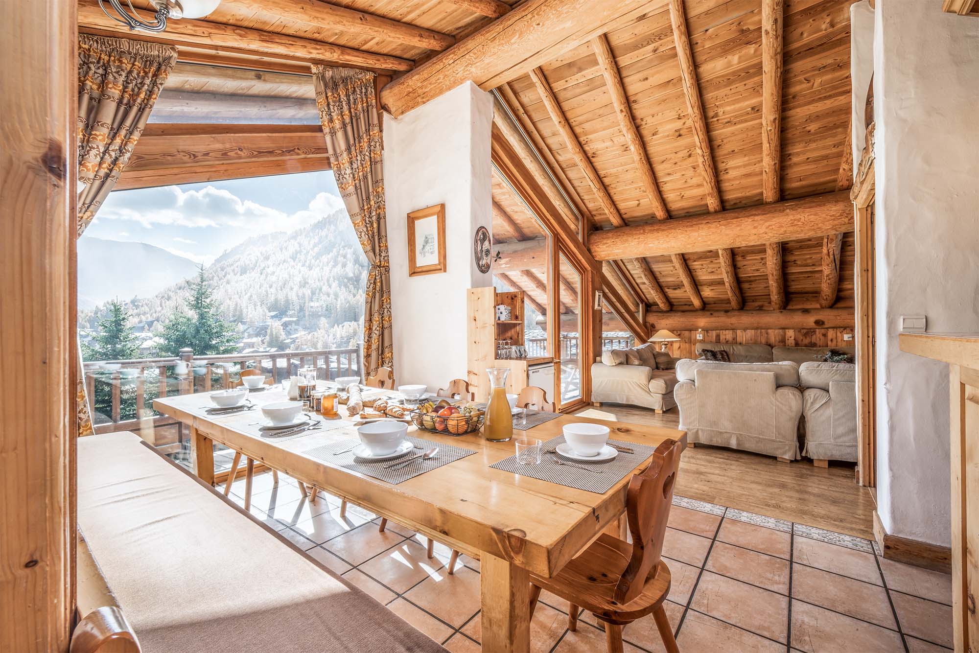 image Savour every meal at our dining table, set against the backdrop of stunning alpine views.