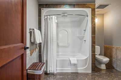 Every bedroom features an ensuite bathroom equipped with a shower/bath combo.