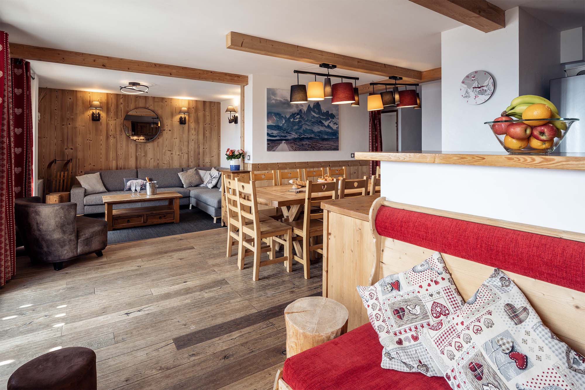 image Relax in the cosy living area featuring rustic wooden beams and a welcoming ambience perfect for unwinding after a day of adventure on the slopes.