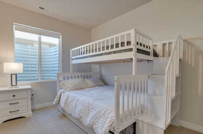 The bunk bed is suited to fit two children comfortably on the queen bed.