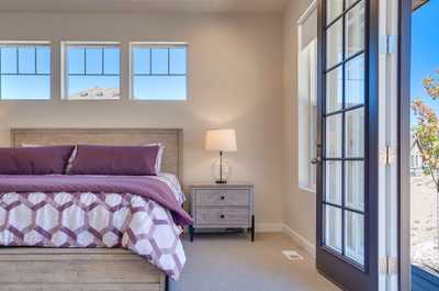 The master bedroom features a comfortable king bed.