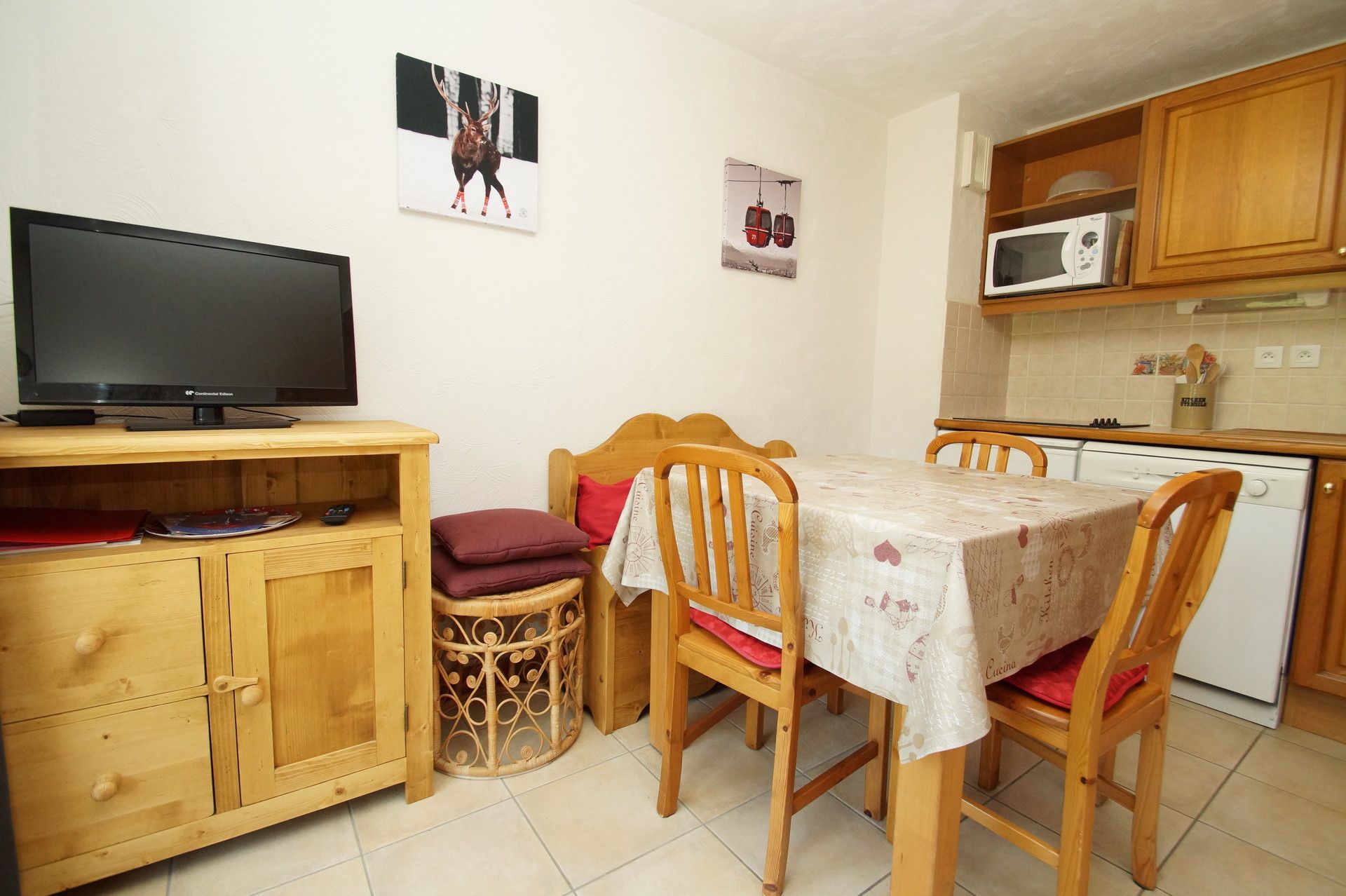 image Relax, watch TV, and dine in our welcoming living space.