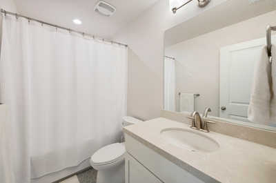 Towels are provided and located in the closet next to this bathroom.