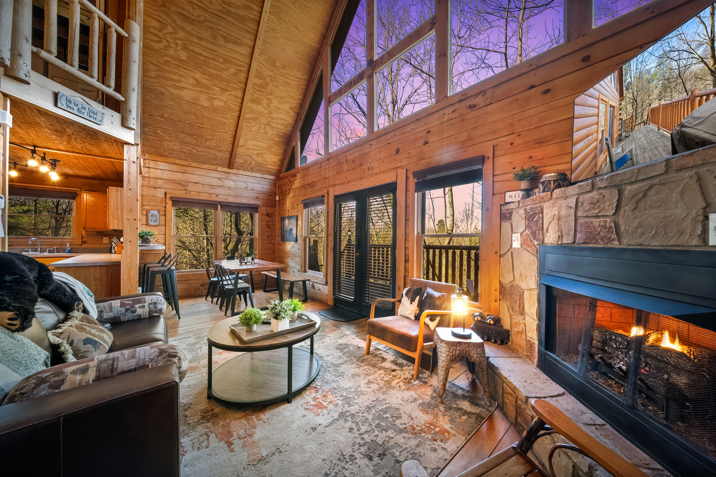 image Cozy up in our rustic living room with a crackling gas fireplace and plush seating, perfect for mountain evenings.