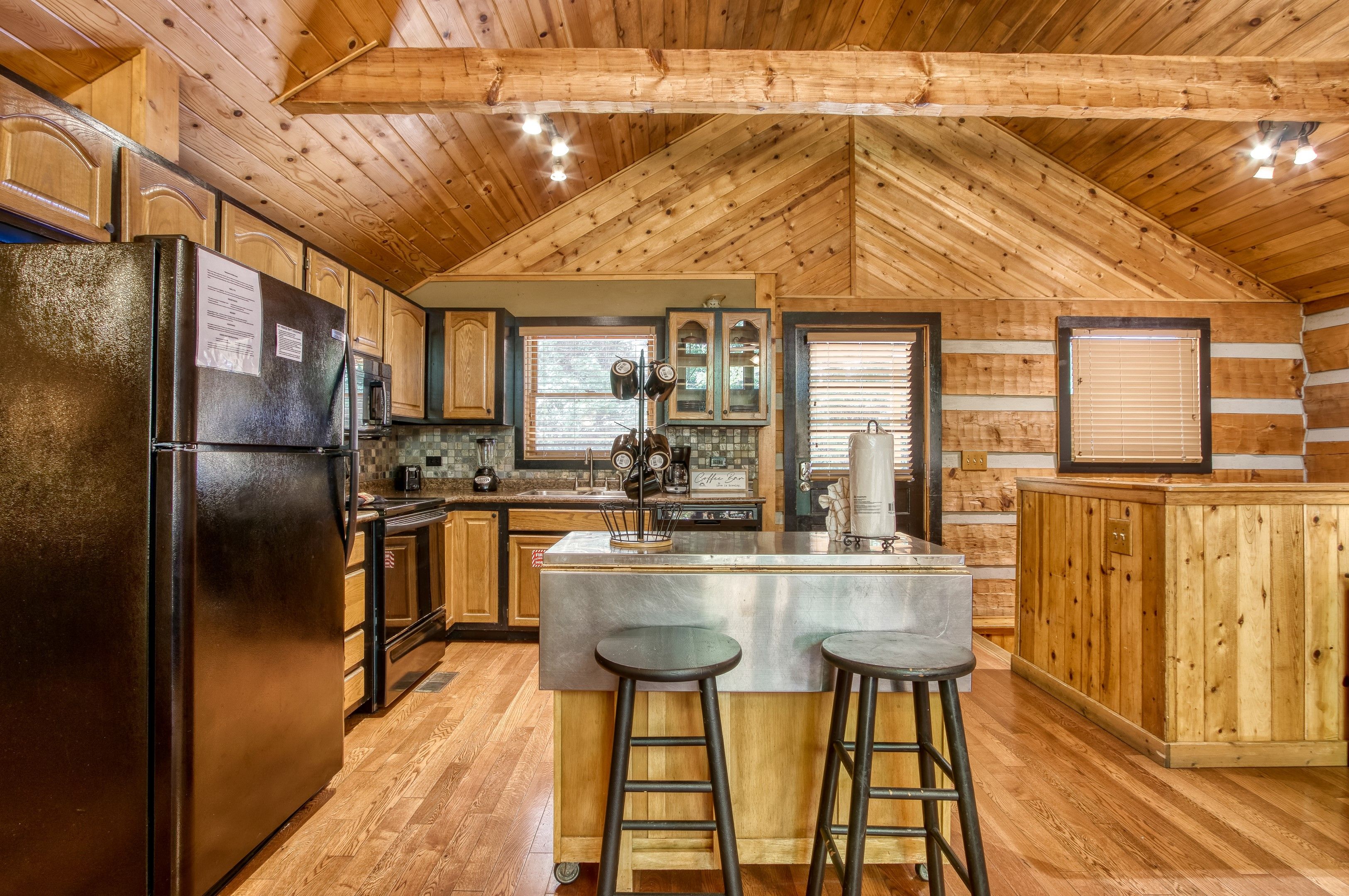 image Rustic charm meets modern convenience in our fully-equipped kitchen.