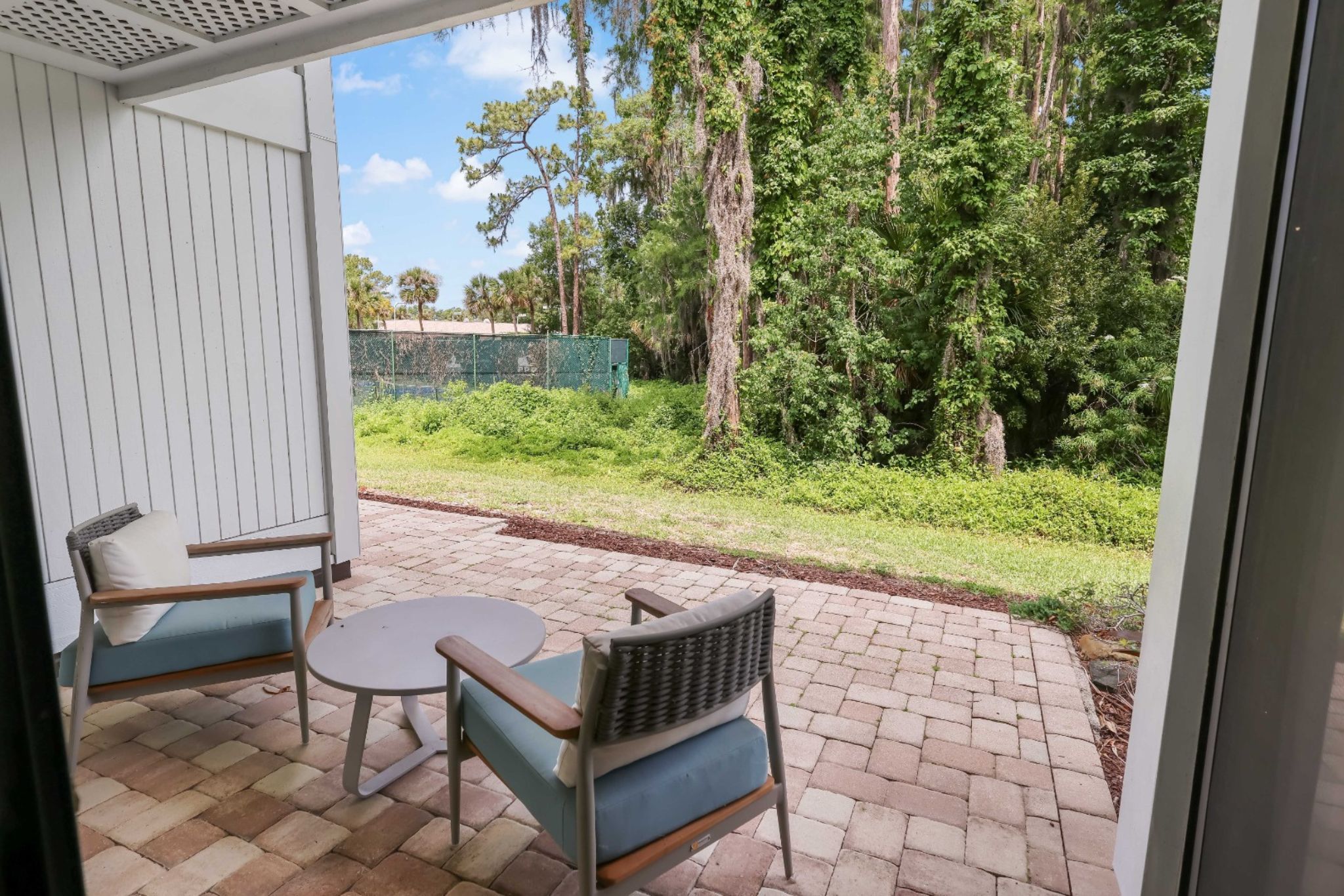 image Step outside to your private patio and soak in peaceful views of nature.