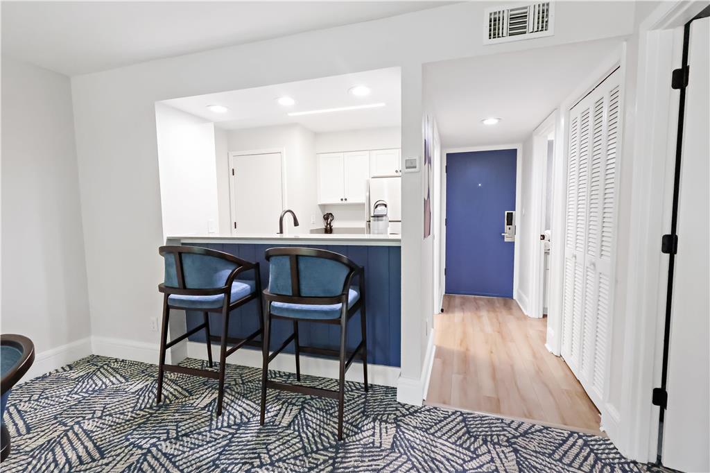 image Enjoy the ease of a fully equipped kitchenette, perfect for casual dining in.
