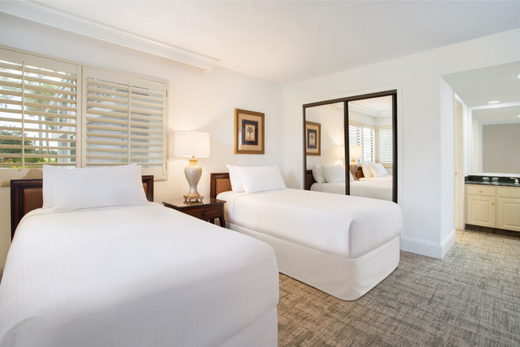 image Unwind in the comfort of this bright, airy bedroom offering peace and serenity.