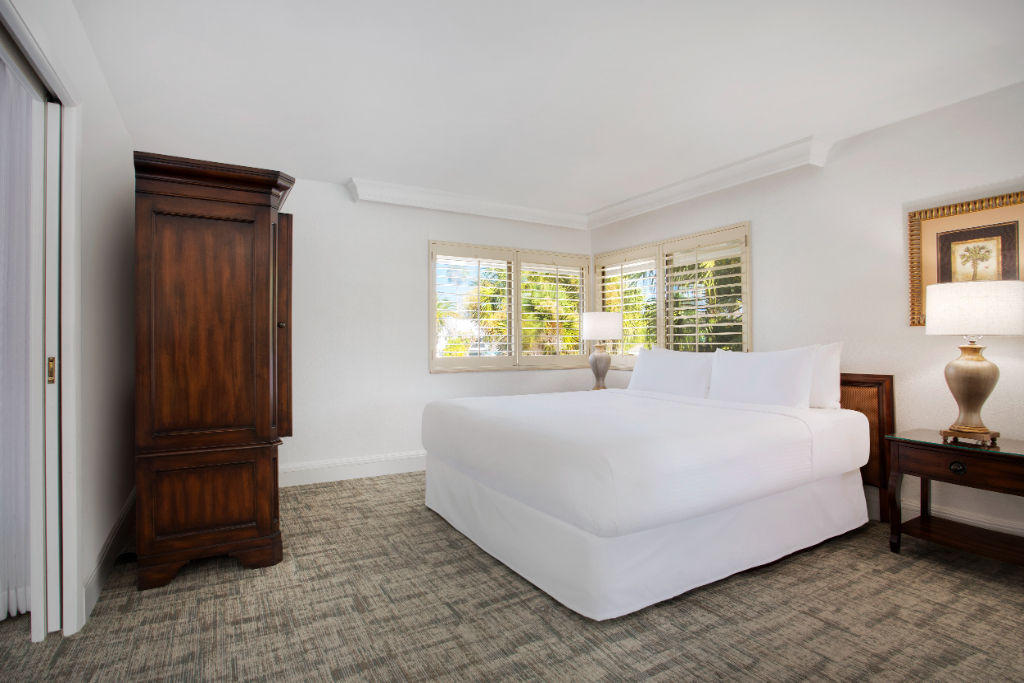 image A peaceful bedroom haven with a plush bed nestled in a cozy nook.