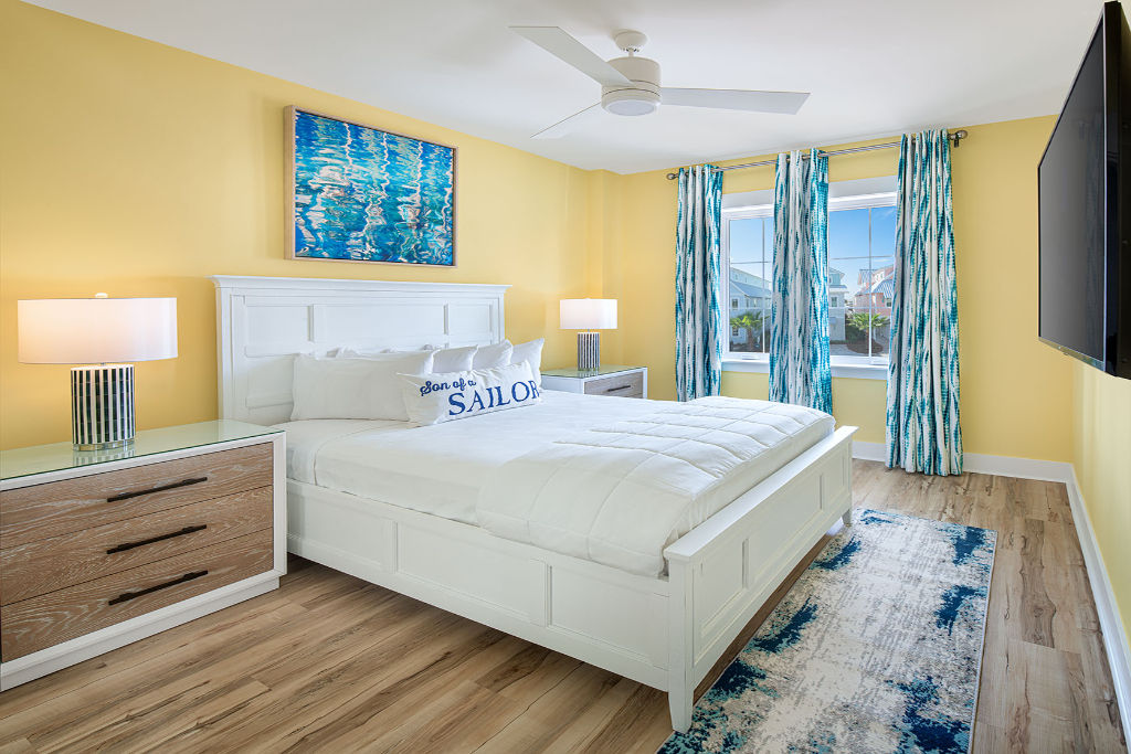 image Welcoming bedroom with sunny yellow accents and a relaxing ambiance.