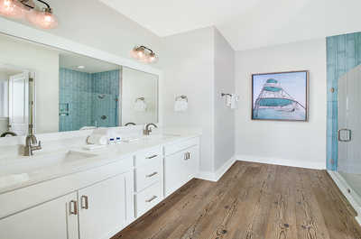 Elegant bathroom with dual vanities and a contemporary design.