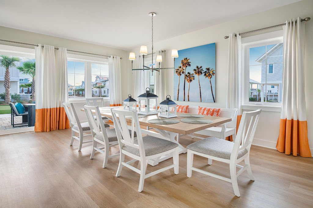 image Bright and airy dining room with a coastal vibe, ideal for lively family dinners or entertaining.