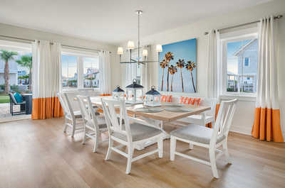 Bright and airy dining room with a coastal vibe, ideal for lively family dinners or entertaining.