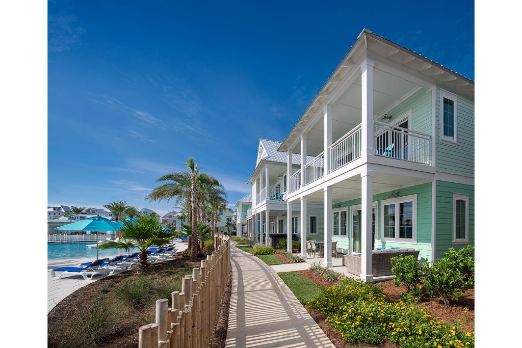 image Beachfront elegance with direct boardwalk access to sandy shores and crystal waters.