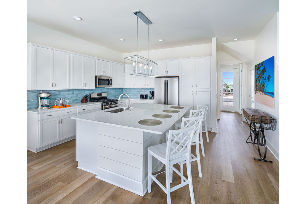 image Sleek, white kitchen space, a blend of modern aesthetics and functional design for culinary adventures.