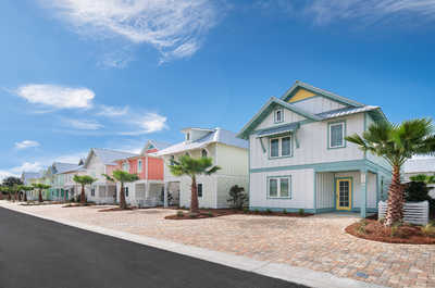 Charming coastal residence boasting elegant architecture and lush landscaping.