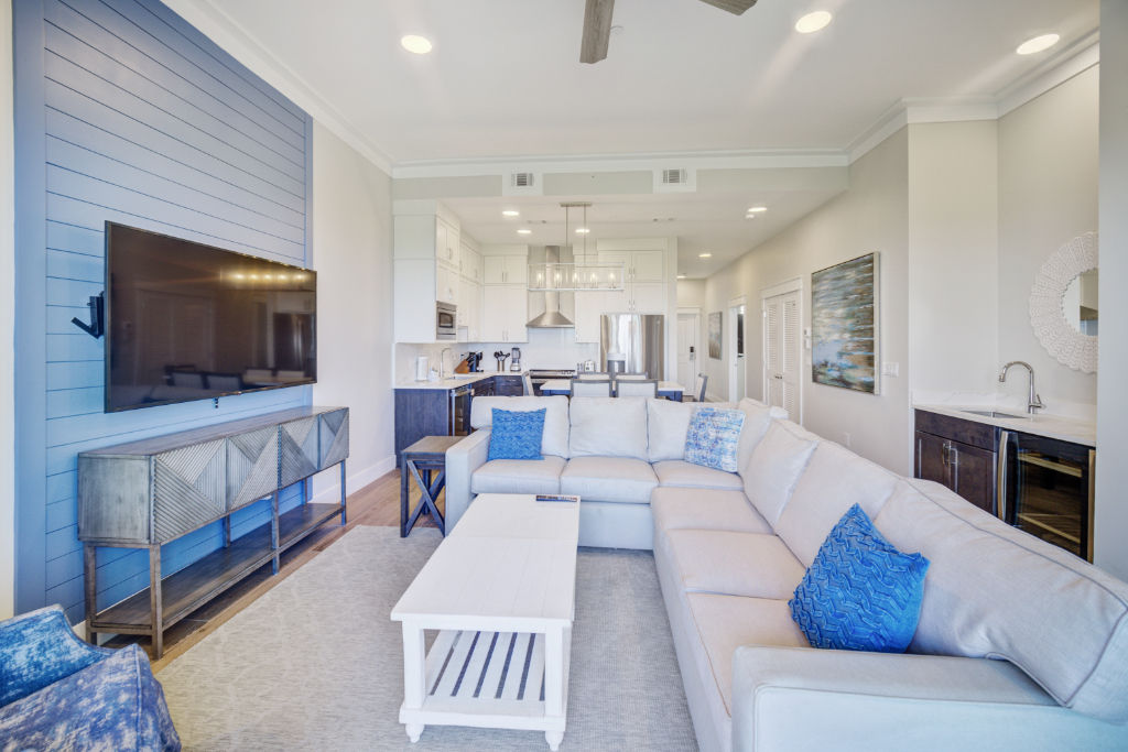 image A beautifully appointed living area that merges modern design with homey comfort.