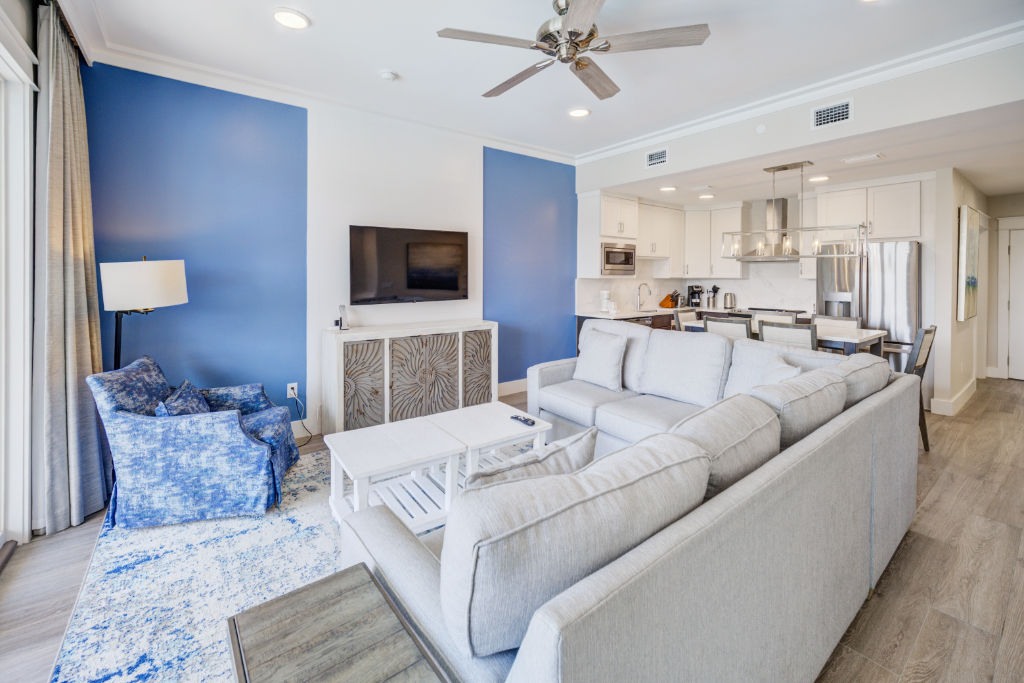 image The perfect blend of living and dining, set against a backdrop of calming blues.