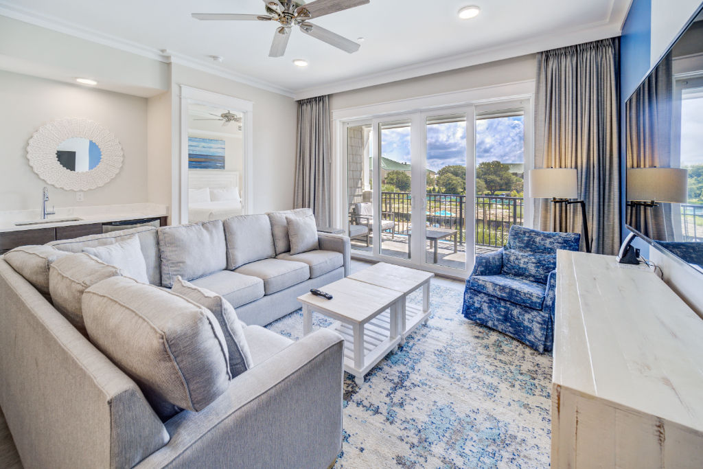 image A plush living area with a soothing palette that echoes the tranquility of the sea.