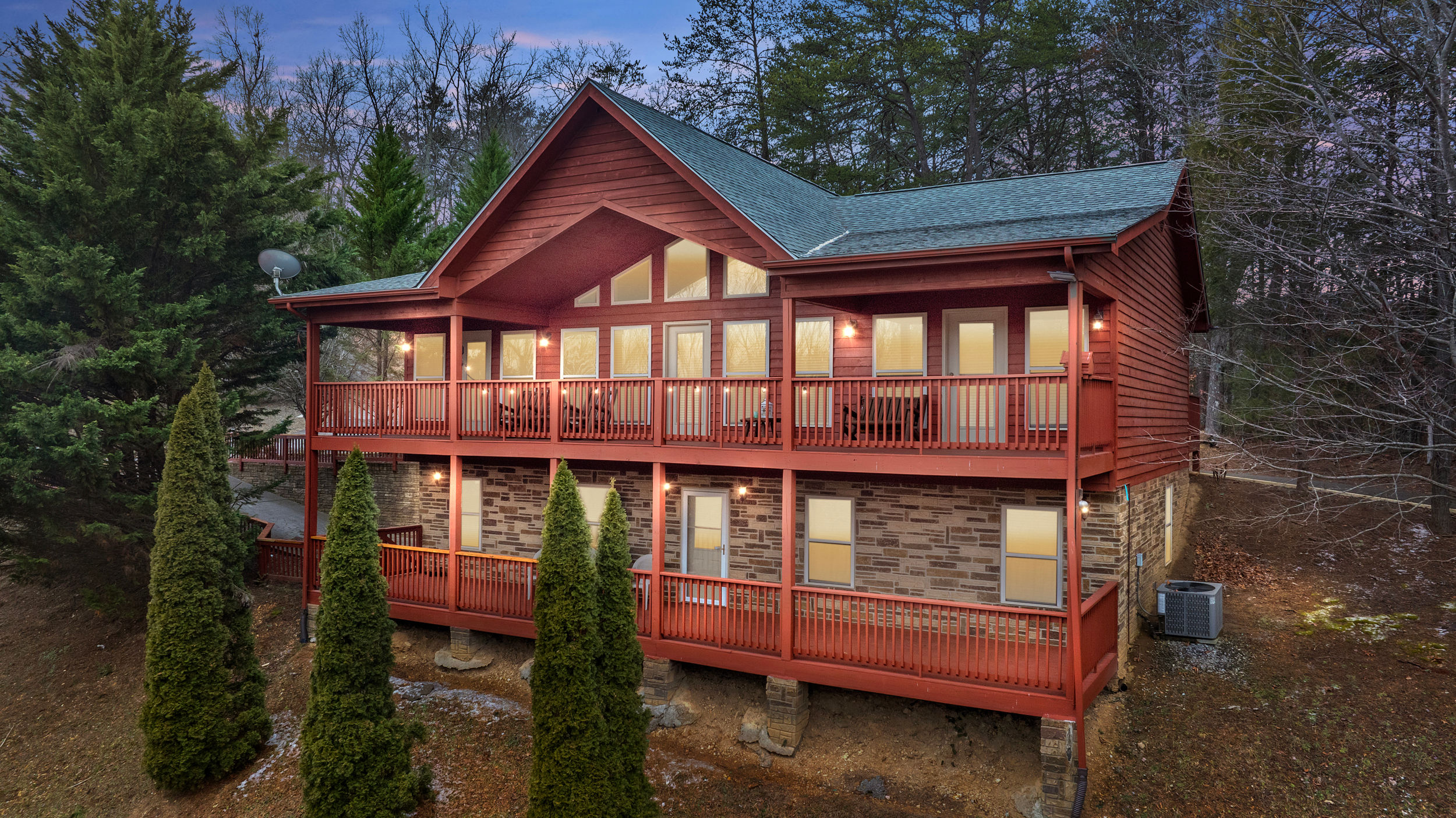 image Welcome to your mountain retreat! Nestled among towering pines, this inviting home offers a serene escape with a spacious upper deck to soak in the natural beauty.