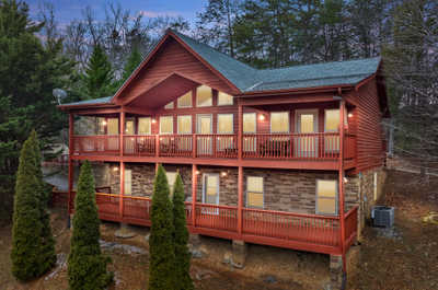 Welcome to your mountain retreat! Nestled among towering pines, this inviting home offers a serene escape with a spacious upper deck to soak in the natural beauty.