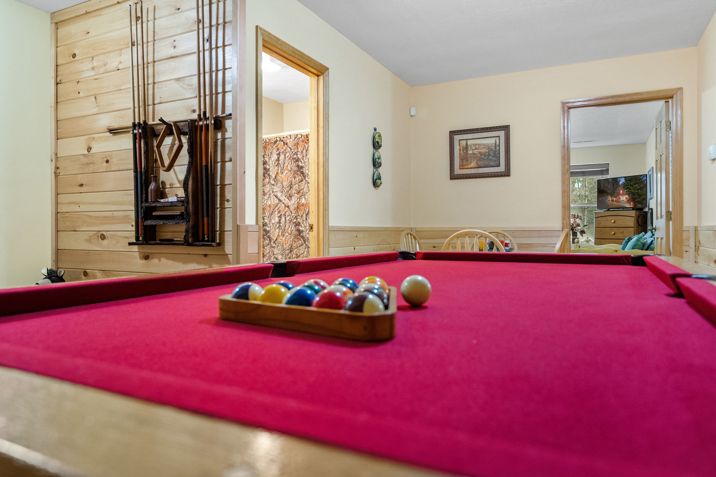 image Engage in some friendly competition in the loft's vibrant pool area, a perfect spot for entertainment and relaxation.