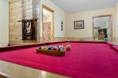 Engage in some friendly competition in the loft's vibrant pool area, a perfect spot for entertainment and relaxation.