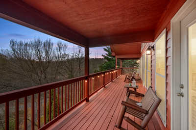 Breathe in the fresh mountain air on the deck while enjoying a picturesque backdrop.