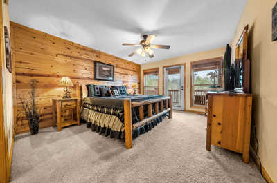 Comfort meets style in this charming master bedroom, a quiet nook for rest and rejuvenation after a day of adventure.