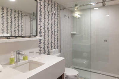 Bright and modern bathroom with sleek fixtures.