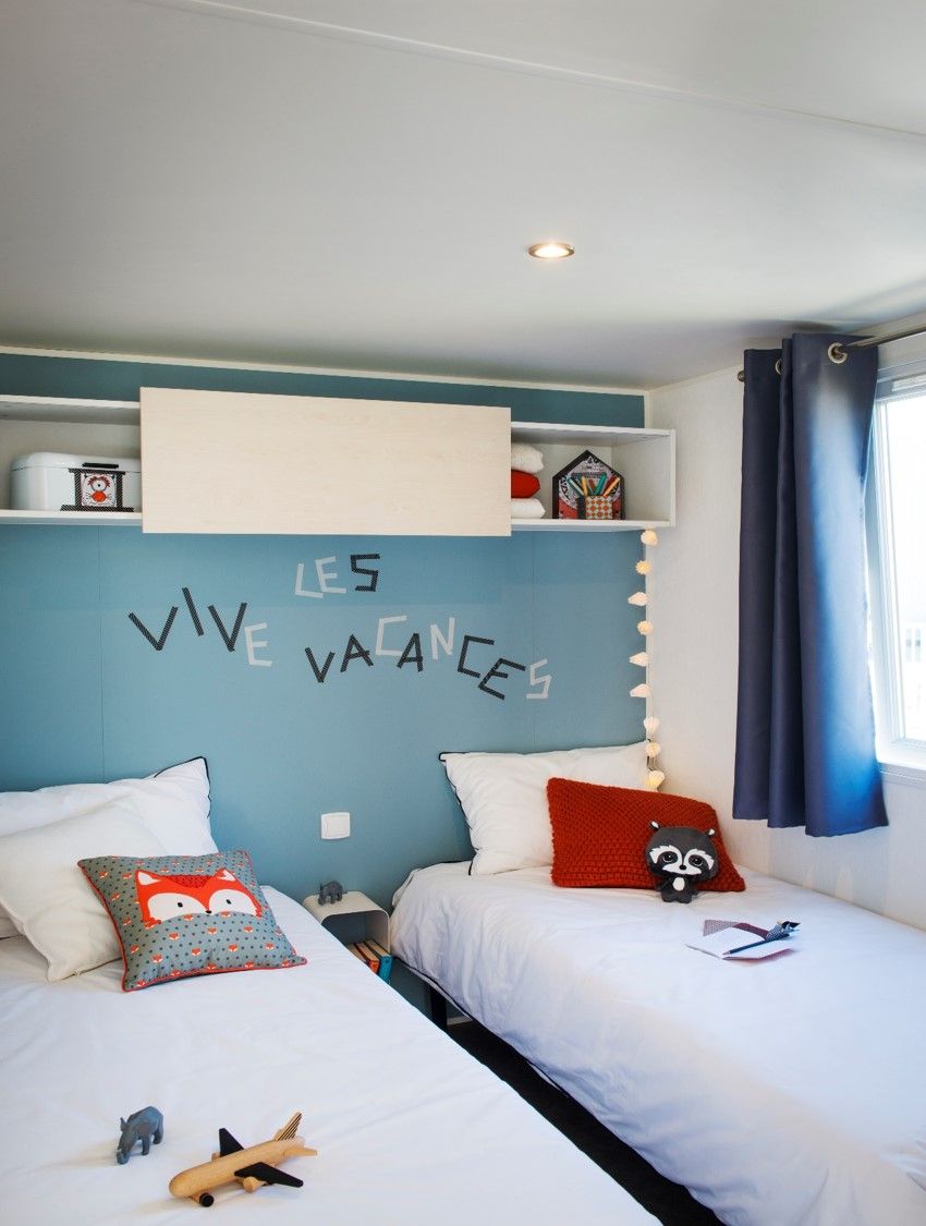 image Simple yet charming bedroom with playful touches, ideal for a restful and enjoyable stay.